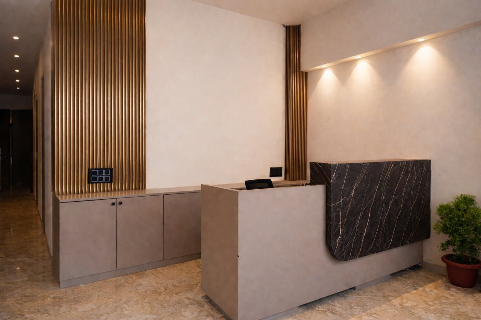HR Premium Stay reception lobby with wood-slat wall and marble counter